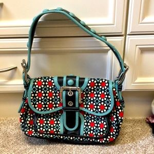 Isabella Fiore, only carried twice. White red and light blue. Very nice.